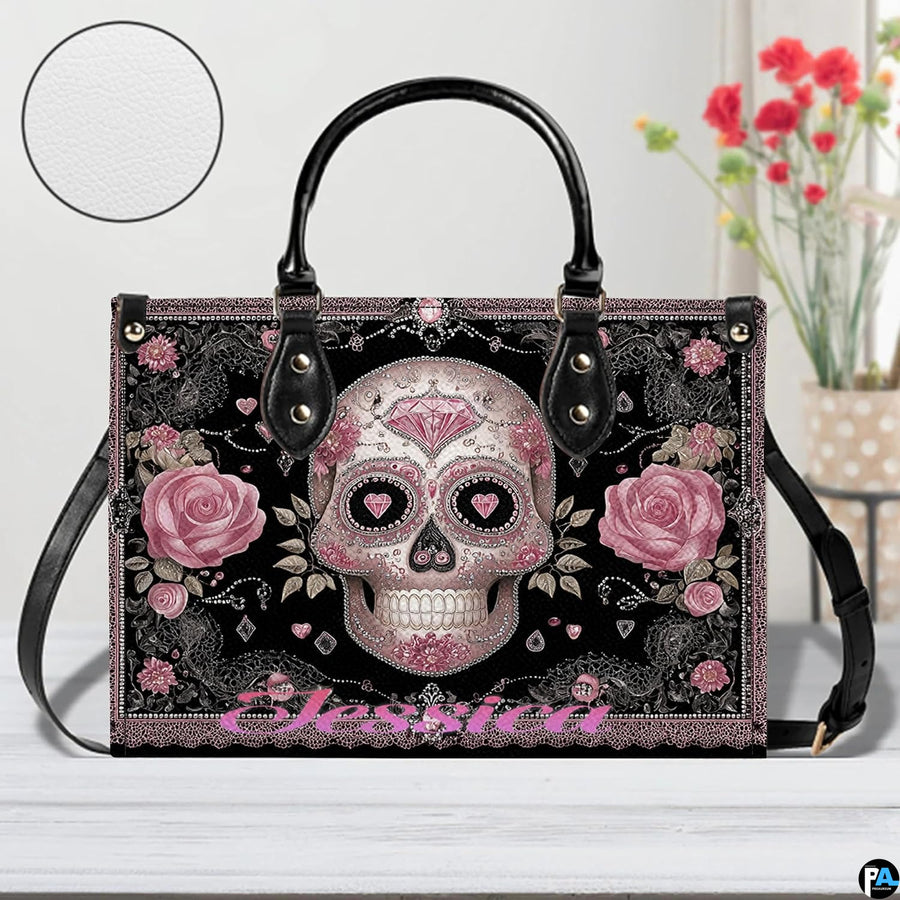 Angle perspective view of the sugar skull handbag showcasing side depth and printed details.