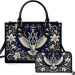 Front view of Marian monogram and dove handbag and matching wallet set with white lilies on navy