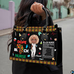 Melanin nurse handbag held outdoors showing visual scale against street setting.