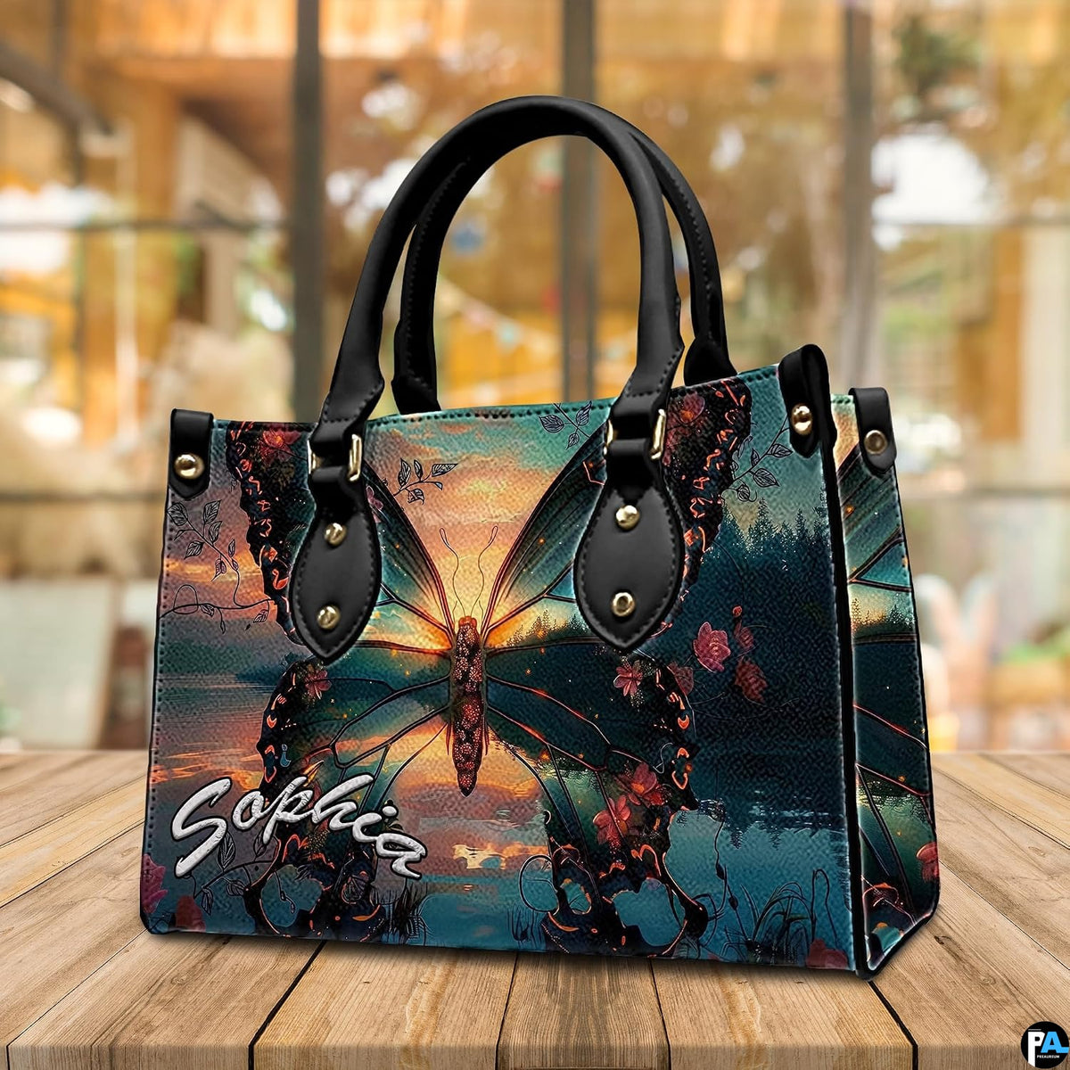 Three-quarter angle view of sunset butterfly handbag set