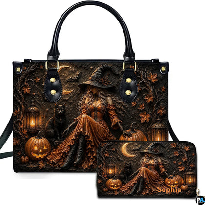 Gothic witch pumpkin handbag displayed beside matching companion wallet.