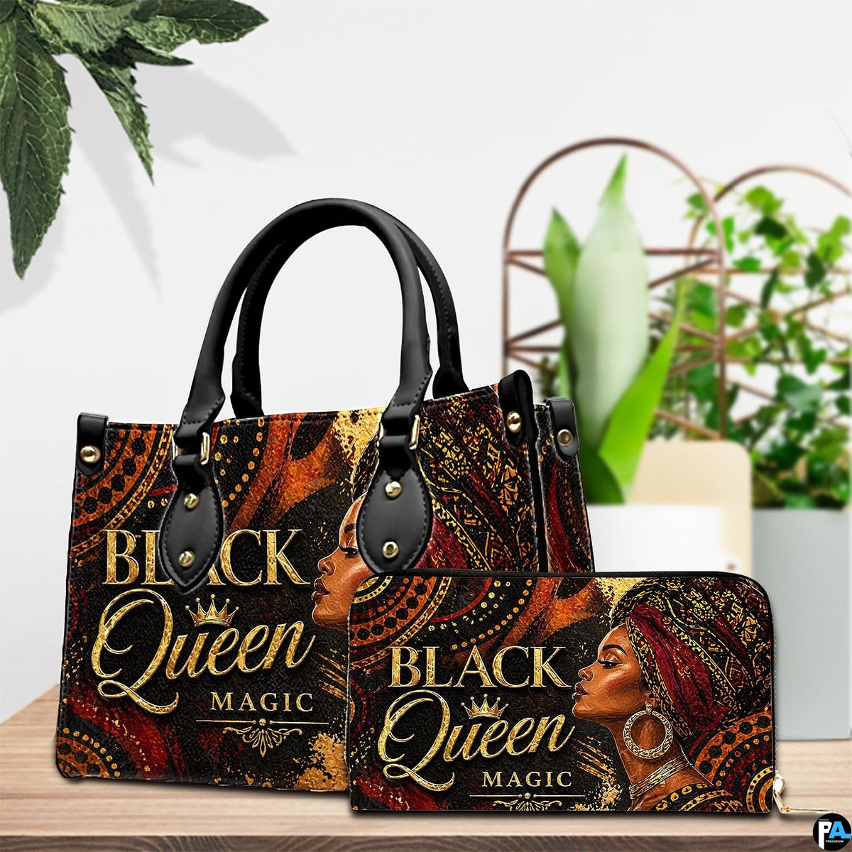 Tabletop presentation showing the empress mandala artwork and coordinating accessory near potted plants.