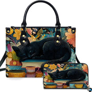 Studio presentation of sleeping black cat art alongside matching rectangular companion accessory.