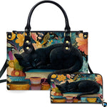 Studio presentation of sleeping black cat art alongside matching rectangular companion accessory.