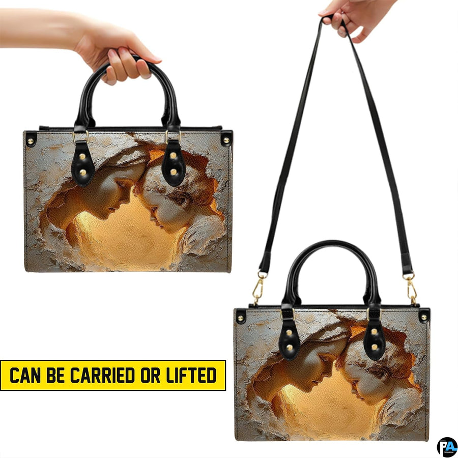 Demonstration of top handle and shoulder strap carrying styles for Mary handbag