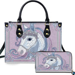 Front view of ethereal crowned unicorn handbag and matching wallet set within an ornate lilac frame.