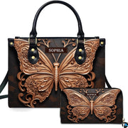 Rose gold filigree butterfly handbag and matching wallet set displayed against a dark studio background.