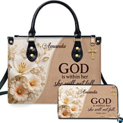 Angled view showing structured dual-tone scripture handbag