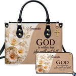 Angled view showing structured dual-tone scripture handbag