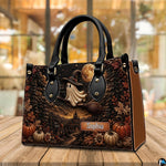 Indoor still life perspective of autumn ghost satchel placed on wooden surface.