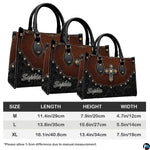 Fashion lifestyle display showing western cross handbag paired with matching coordinating wallet.