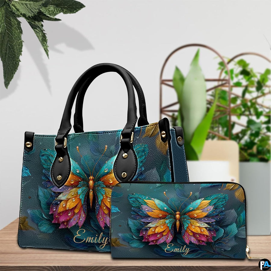 Butterfly handbag and matching wallet displayed together on tabletop setting