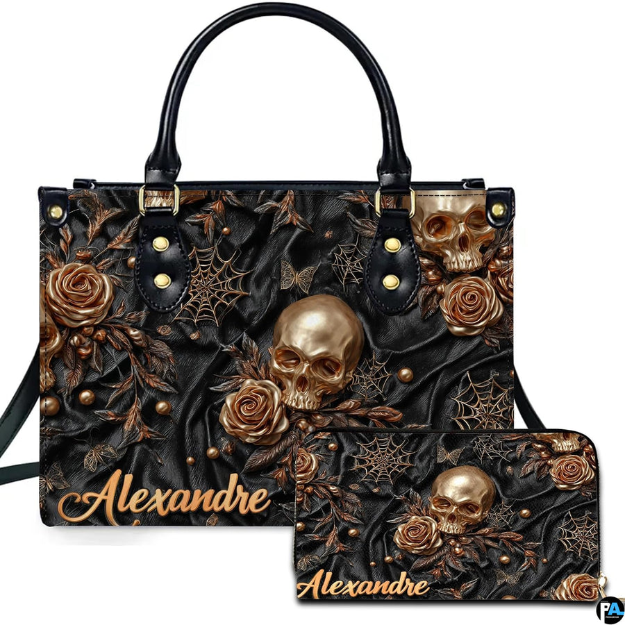 Gothic golden skull rose handbag and matching wallet set on white studio background.
