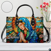 Tabletop presentation of religious art accessory accompanied by round material texture circular inset.