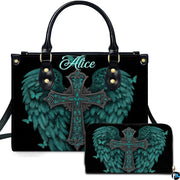 Turquoise angel wings cross handbag and matching wallet set featuring feathered wings on black.
