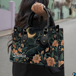Outdoor model showcasing nocturnal black cat and golden moon garden artwork.