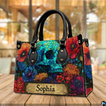 Stained glass skull handbag displayed on wooden plank table before indoor window.