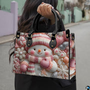 Outdoor handheld perspective showcasing the festive pink snowman candy illustration under natural daylight