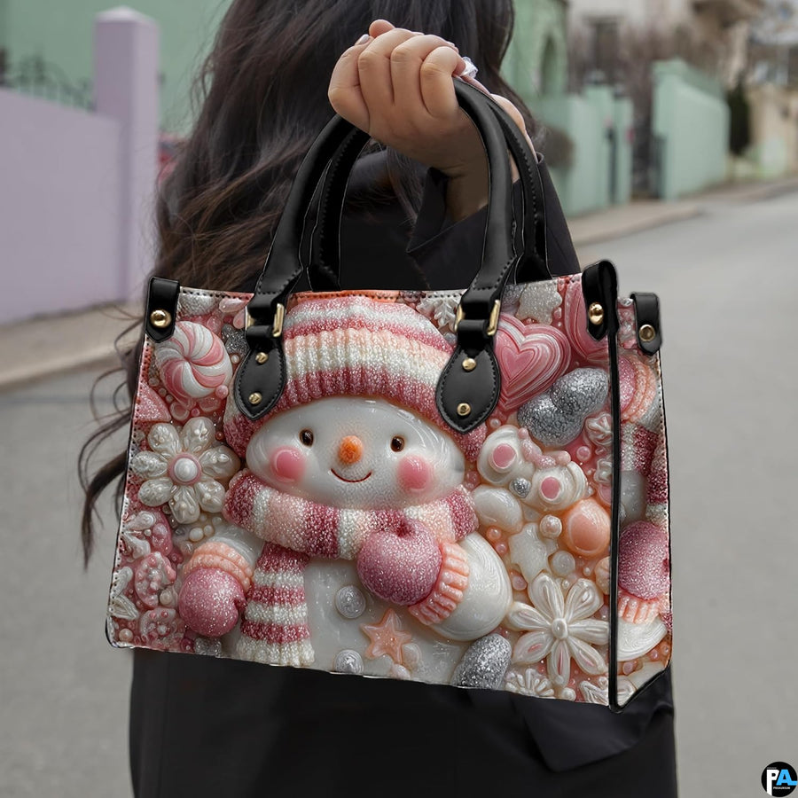 Outdoor handheld perspective showcasing the festive pink snowman candy illustration under natural daylight