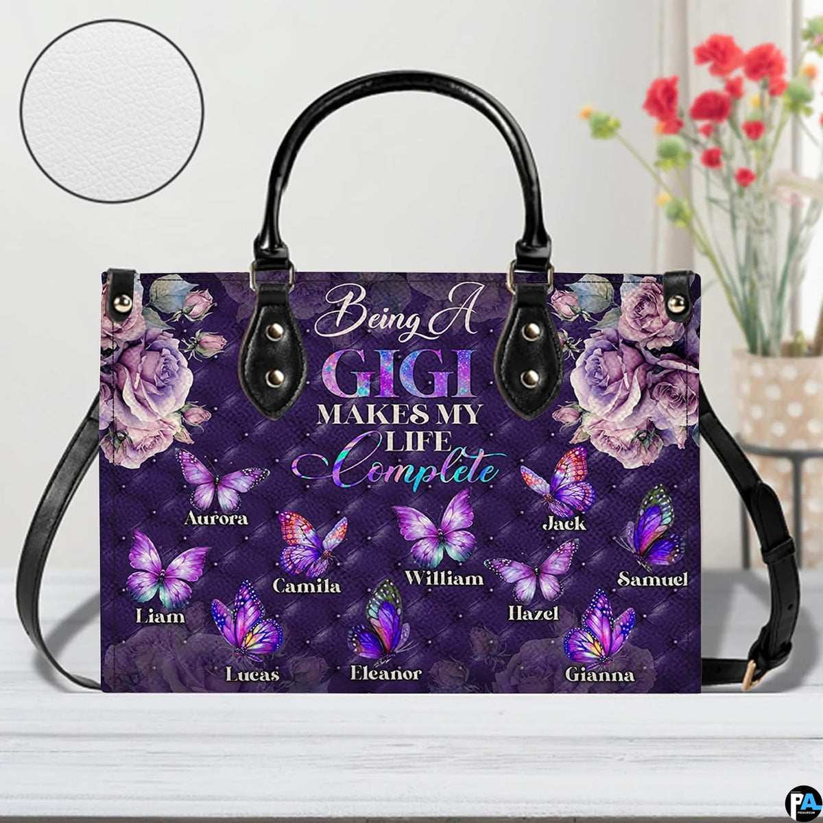 Arrangement of purple handbag and wallet presenting the unified diamond butterfly theme.