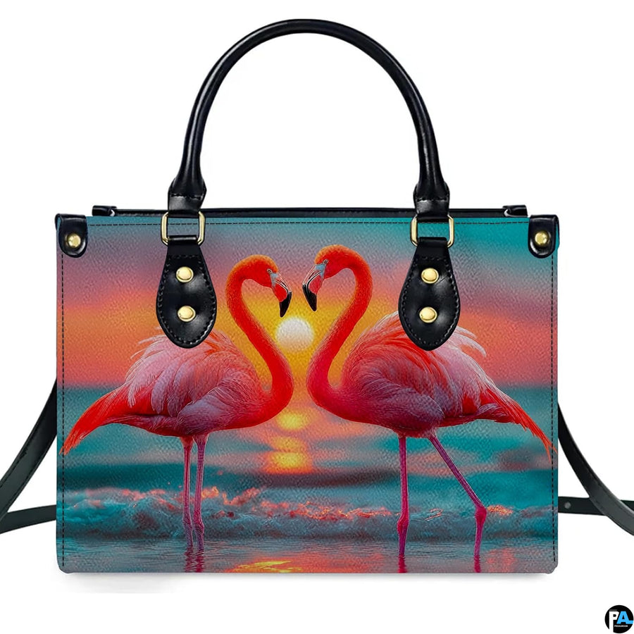 Angled display highlighting the romantic flamingo heart silhouette and ocean waves.
