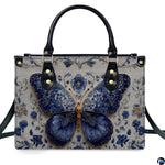 Straight-on studio portrait of Delftware floral butterfly handbag against white background