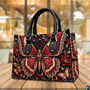 Side profile of crimson butterfly handbag showing clean seams and dark botanical pattern