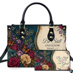 Front view of teal baroque floral damask handbag and matching wallet with golden arches and magenta roses.