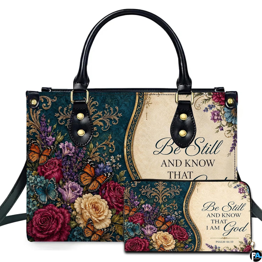 Front view of teal baroque floral damask handbag and matching wallet with golden arches and magenta roses.
