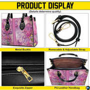 Top-down view of pink handbag showing dual handles and interior storage opening.