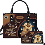 Christian faith wooden cross scripture handbag and matching wallet set displayed upright on white background.