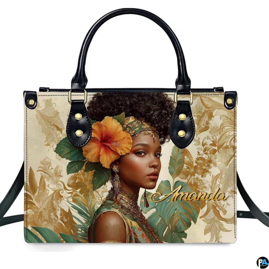 Studio front view showcasing Black woman portrait, orange hibiscus bloom, and golden filigree.