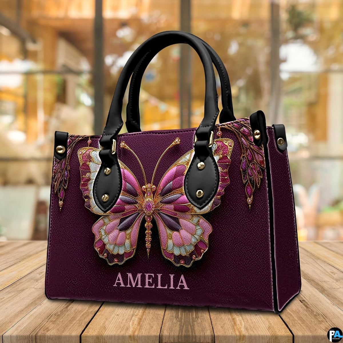 Back view of jeweled butterfly handbag displaying textured deep plum exterior surface