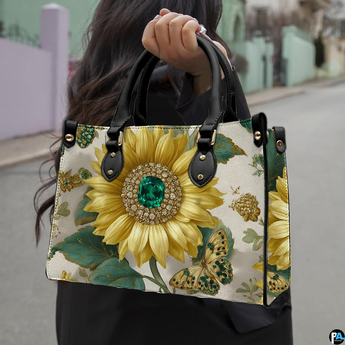 Model outdoors holding golden jeweled sunflower handbag