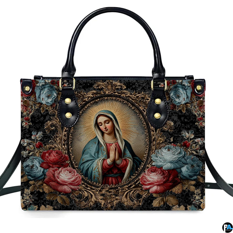 Handbag displayed outdoors in daylight showing rich damask floral background.