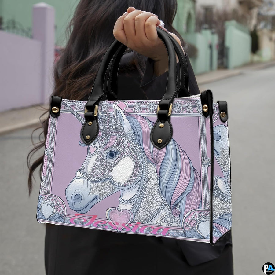 Model outdoors carrying pastel purple crowned unicorn handbag