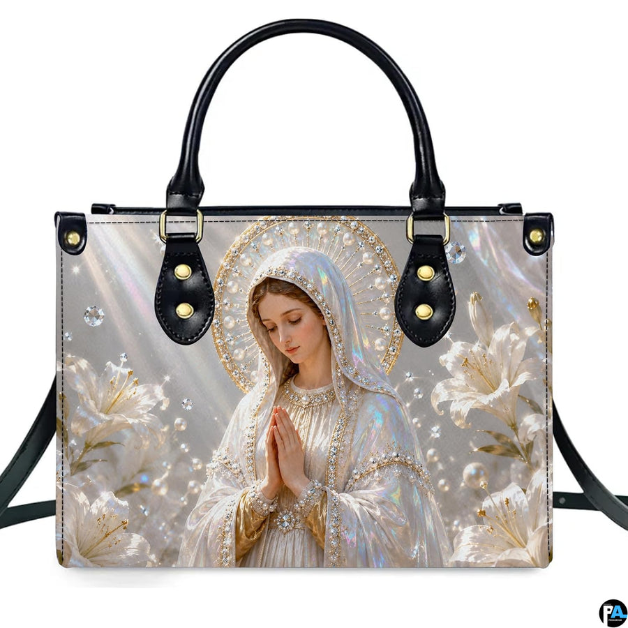 Lifestyle display of pearlescent Madonna handbag carried by model showing artwork and scale
