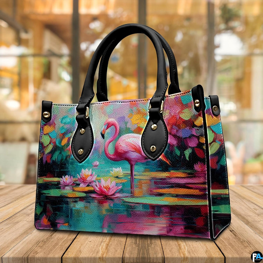 Lifestyle model display showing the pink flamingo handbag carried over the shoulder.