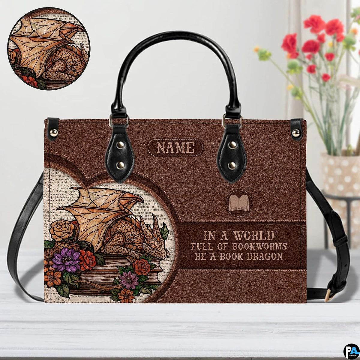 Close-up detail of handbag highlighting golden dragon scales, blooming roses, and vintage print backdrop