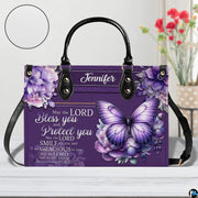 Side profile showing structured silhouette and purple panel of violet butterfly handbag.