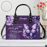 Side profile showing structured silhouette and purple panel of violet butterfly handbag.