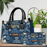 Studio presentation of indigo botanical art accessory paired beside matching zip companion item.