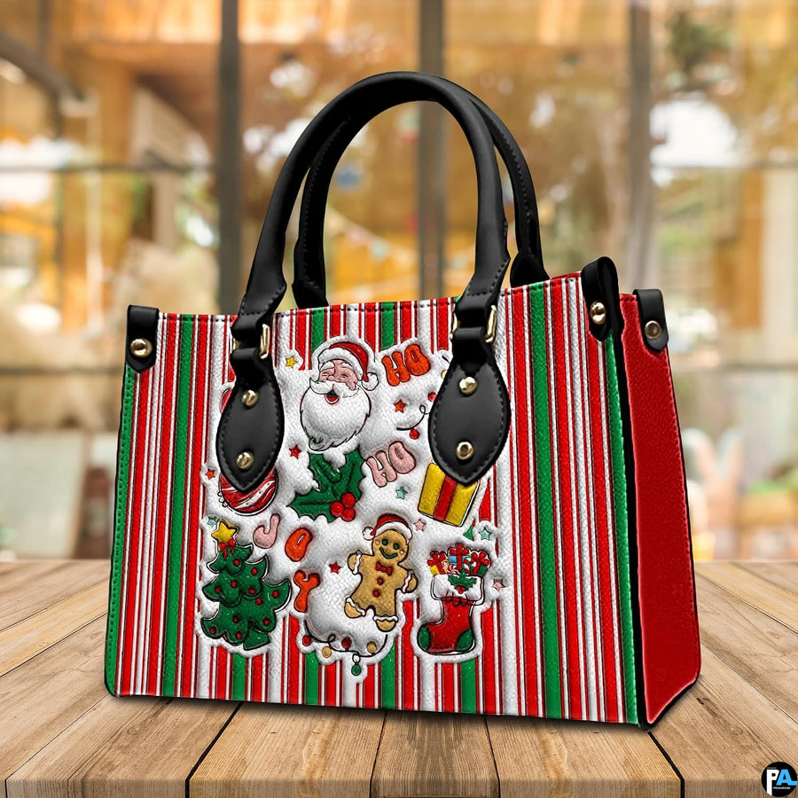 Three-quarter perspective view of striped holiday Santa handbag resting on a rustic wooden table.