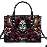 Dia de los Muertos sugar skull gothic rose handbag shown alone on white background.