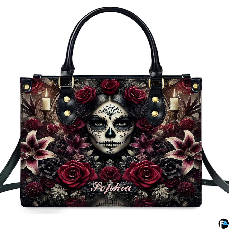 Dia de los Muertos sugar skull gothic rose handbag shown alone on white background.
