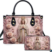 Front view of Virgin Mary handbag and matching wallet set with blush roses and baroque border