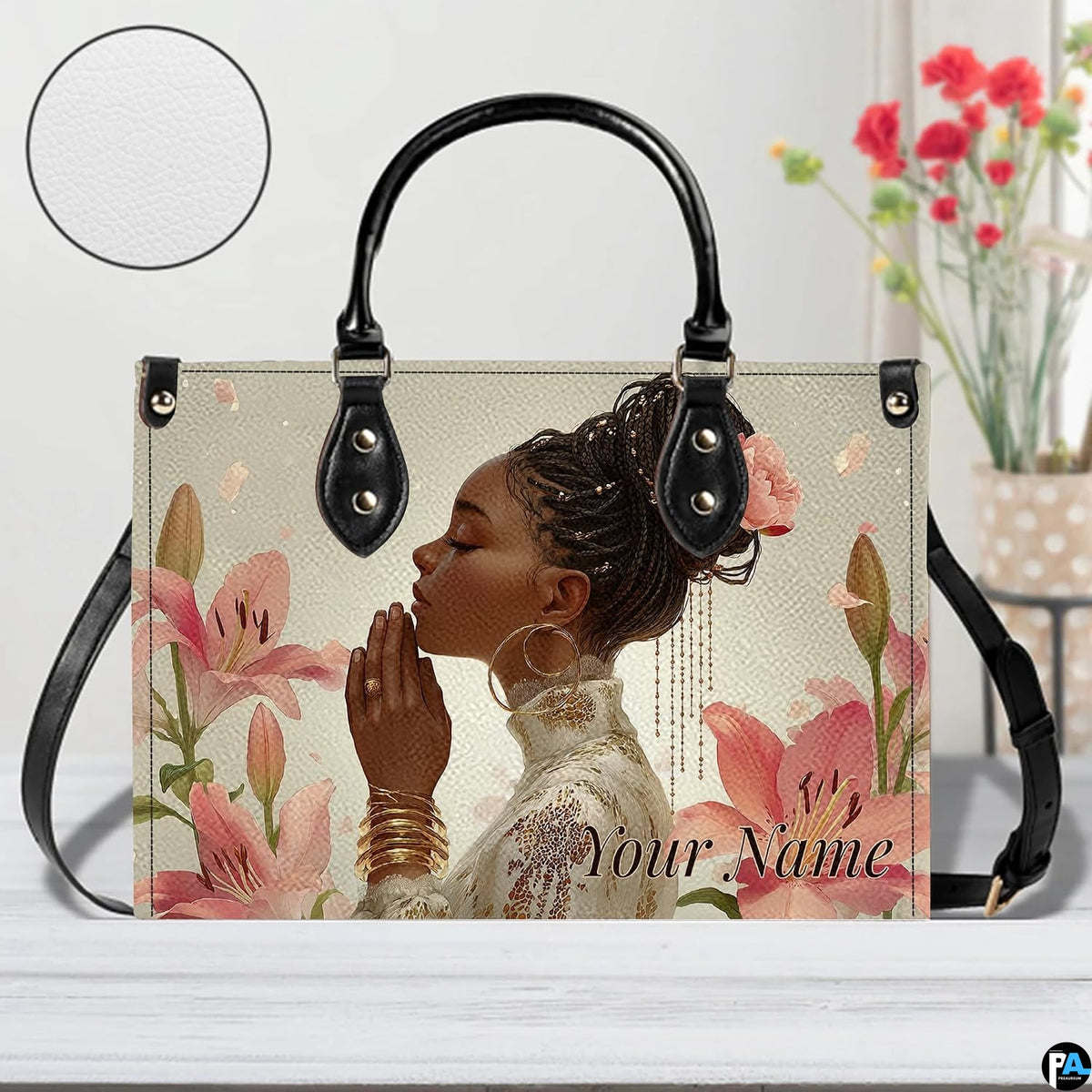 Frontal studio display on white wooden planks featuring the praying woman print with background flowers.