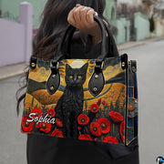 Outdoor pedestrian holding an accessory showcasing poppy cat art during a daytime stroll.