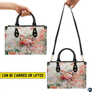 Interior view of the handbag displaying lining and spacious central compartment.