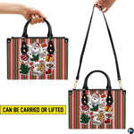 Handbag display demonstrating hand-held top handle and shoulder carrying arrangements.